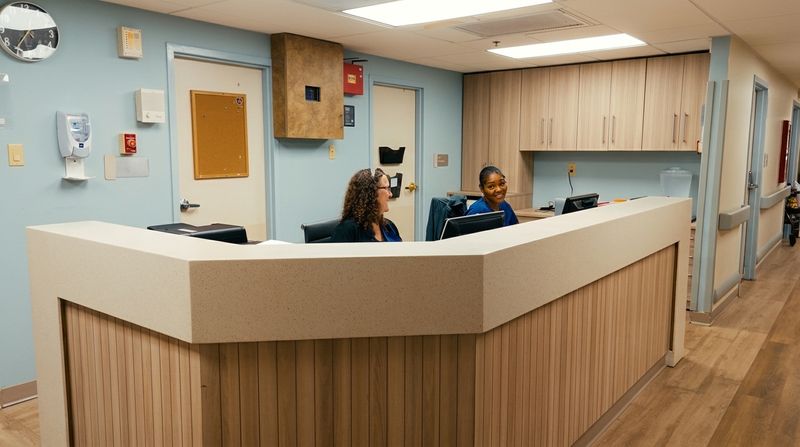 Brookshire's nurses' station, with staff at work